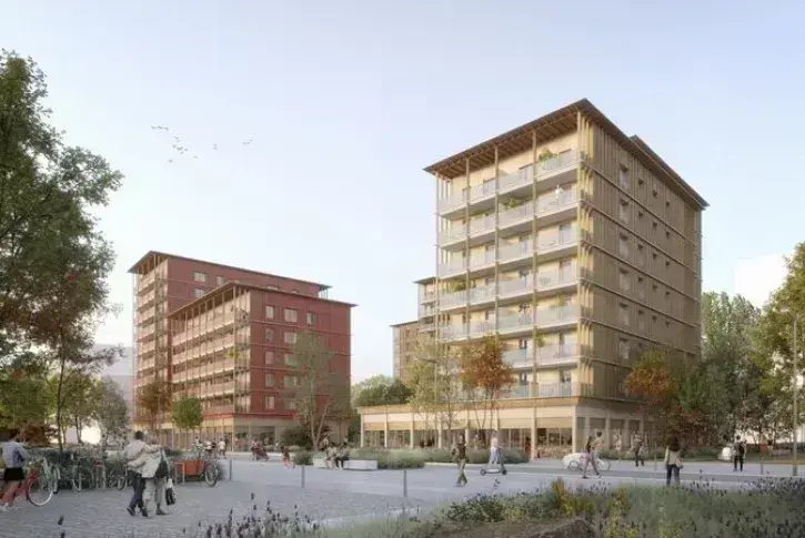 L'îlot A2B, original avec ses façades en paille et ossature bois, comptera 147 logements abordables et sociaux, avec quelques commerces en rez-de-chaussée (supérette, tabac-presse, etc.) et de vastes locaux pour les vélos et vélo-cargo. © NMA - MFLA GHT –