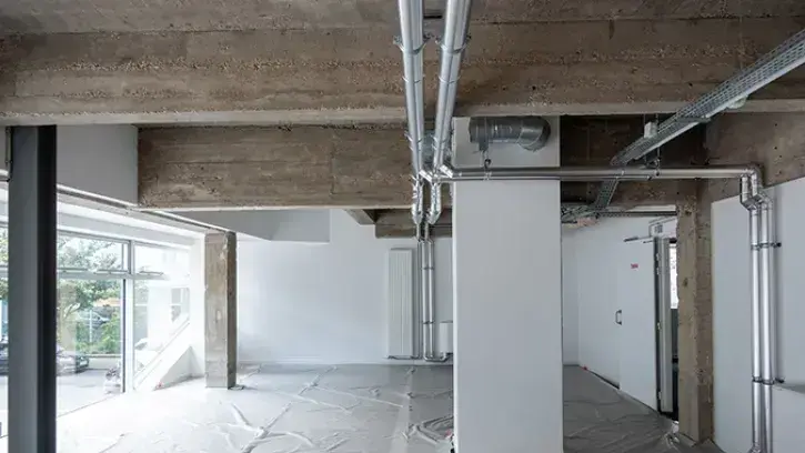 L'un des principaux enjeux de la rénovation a été de conserver la structure béton originelle. © Patrick Garçon